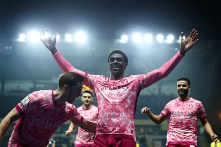 Touré celebrates a Norwich goal Touré celebrates a Norwich goal